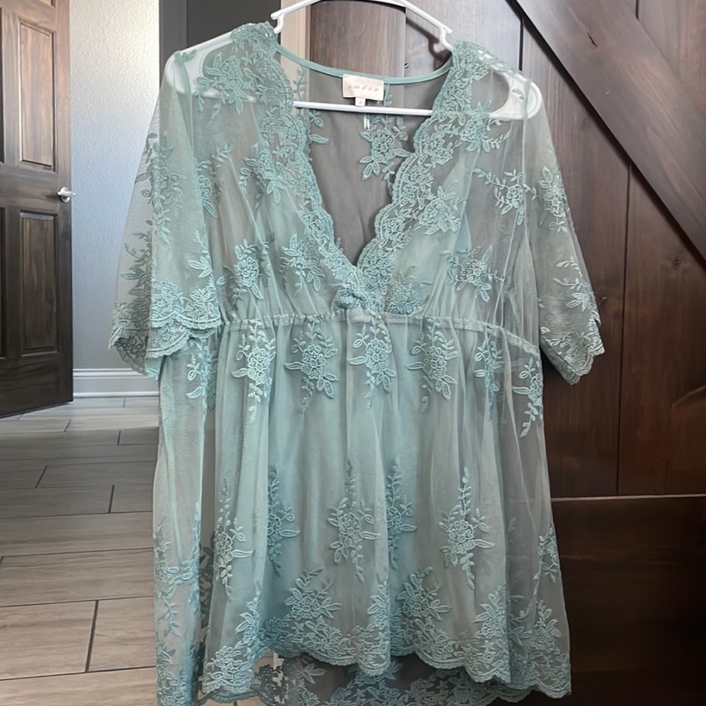 Beautiful brand new never worn sage green lace top with matching cami.